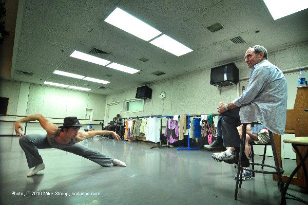Bill Shapiro (right, on stool) in rehearsal run through with dancer Gavin Stewart in Tower of Song by Leonard Cohen and choreographed by Josh Beamish